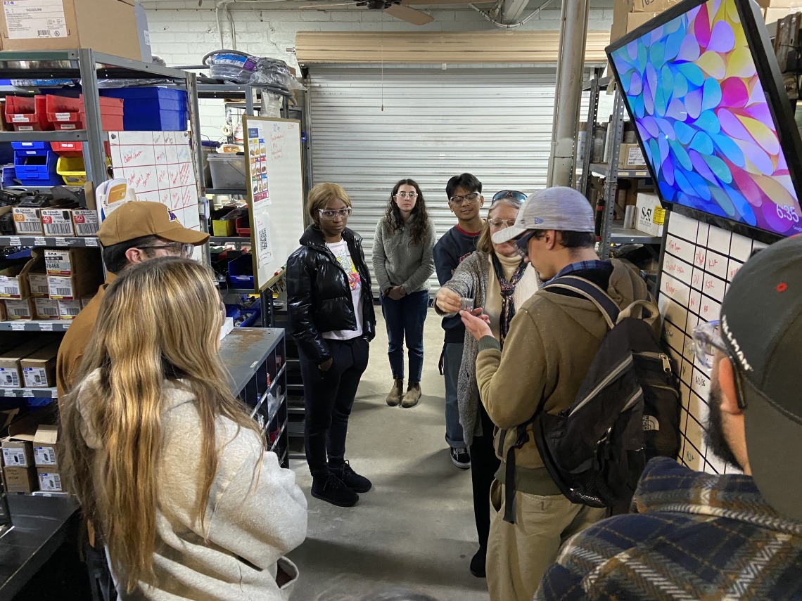 Students touring warehouse